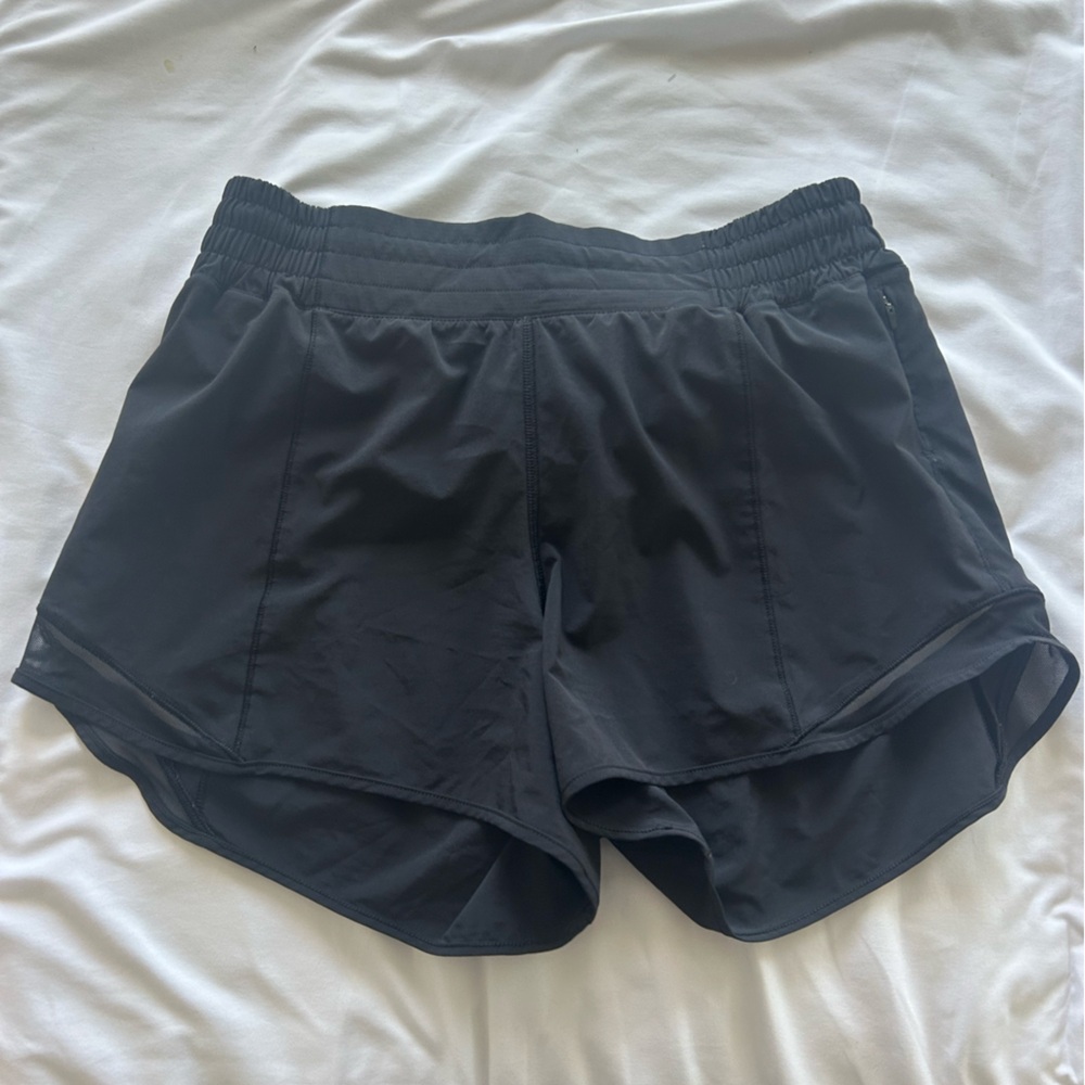 Lululemon black hotty hot high rise 4 inch size 8 tall